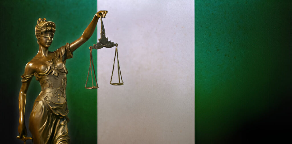 picture of a nigeria flag with a scale justice to lagos real estate investment from abroad