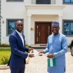 Picture of Gbenga Adeyeye helping a nigeria diaspora man to acquire property