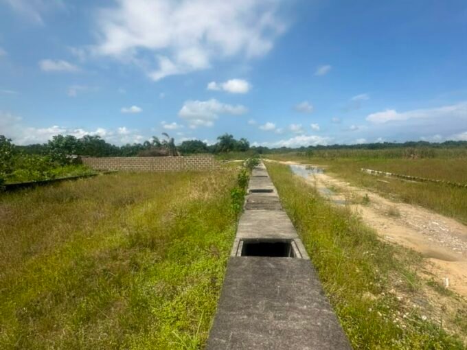 ajah land for sale showing a picture of a land in a developed area pictured by ATLAS Realtors