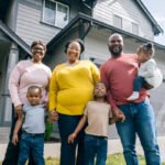 buy property in nigeria from usa showing a picture of a man with his family happy with their homes made by ATLAS Realtors